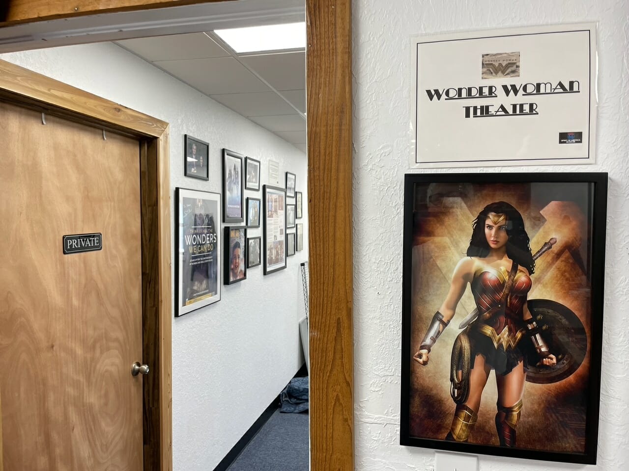Hallway with Wonder Woman-themed decor