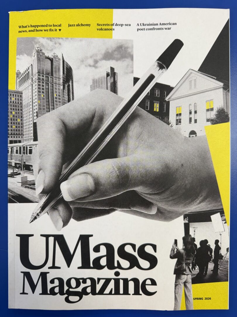UMass magazine cover with giant pen