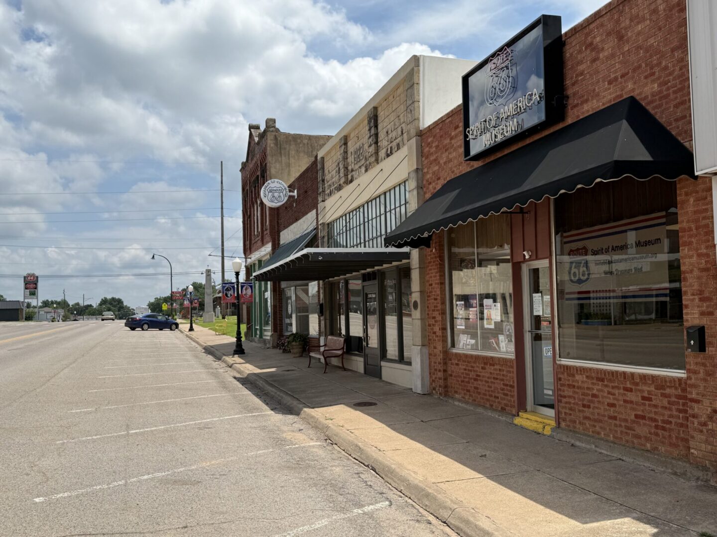 Main street storefronts with museum awning